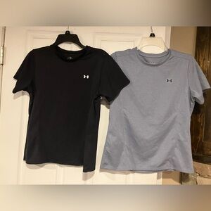 Woman’s Under Armor shirts medium